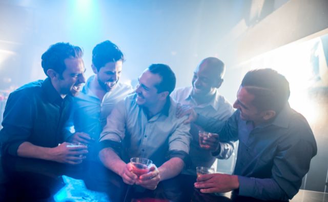 men at a bar
