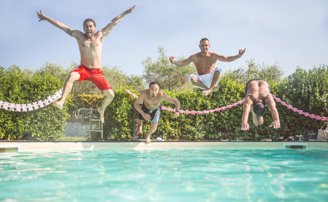 stags diving into a pool